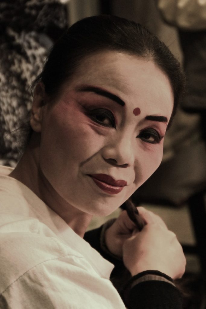 This is a photo of women performing in Sichuan opera
