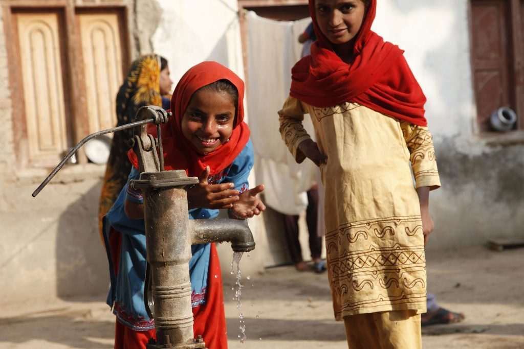 In India, the safety of tap water varies by region. Many areas face challenges with pollution and inadequate treatment, making tap water potentially unsafe. It’s advisable to use boiled, filtered, or bottled water, especially for visitors, to avoid health risks. Photo: Children in Sindh, Pakistan, play at a water pump in a village. Credit: UK Department for International Development/ © CC BY 2.0 Deed