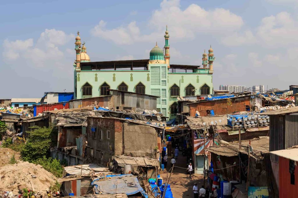 Dharavi, one of Asia’s largest slums, sprawls near Mahim Junction in Mumbai, India, housing a dense network of shanty homes. Photo: A. Savin © FAL
